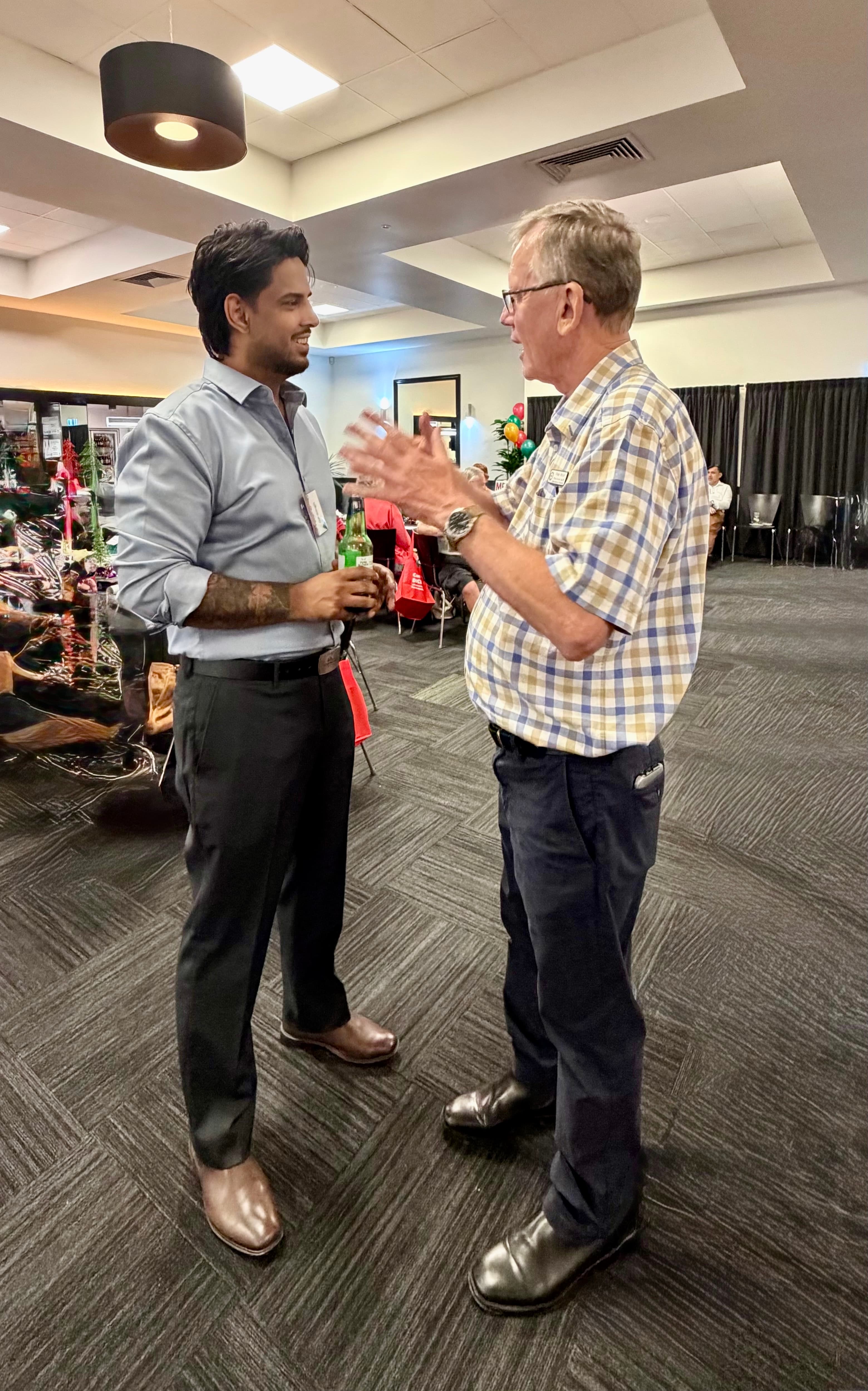 GP Singh in conversation at a community Christmas event